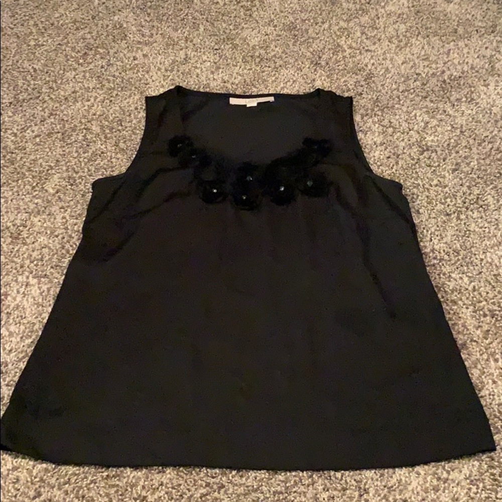Cute black loft tank with details around neck line